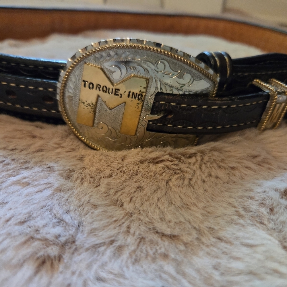 Black and Gold Leather Belt with Elegant Design